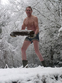 Carrying wood in the snow