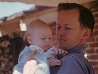 me with dad at 2 months