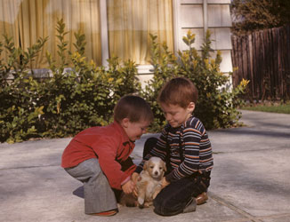 Roger and me with puppy Fluffy, March 1948