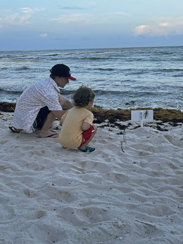 Benji and Kovu at a turtle nest