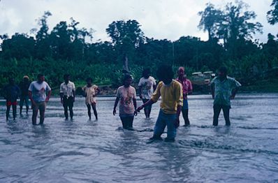 SPC trainees measuring water pollution