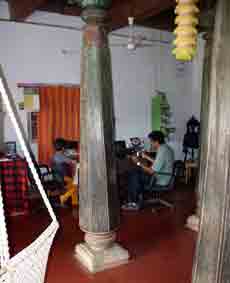 Sheshagiri Rao and his son at their computers