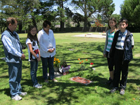 Greg and family at grave