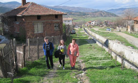 near the top of the village