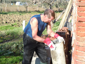 clearing a space for compost bins