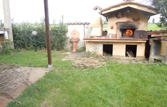 burning branches in the pizza oven